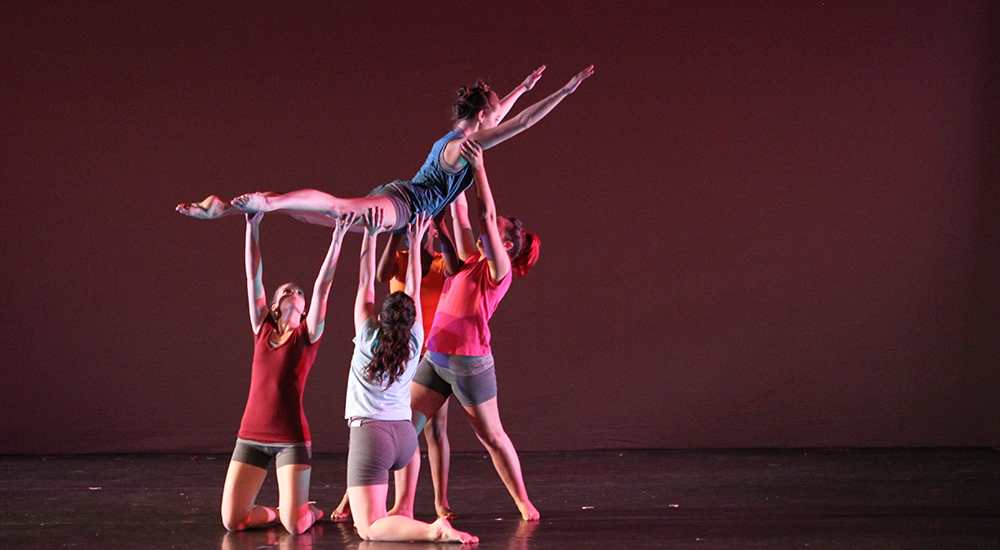 Students on stage performing 